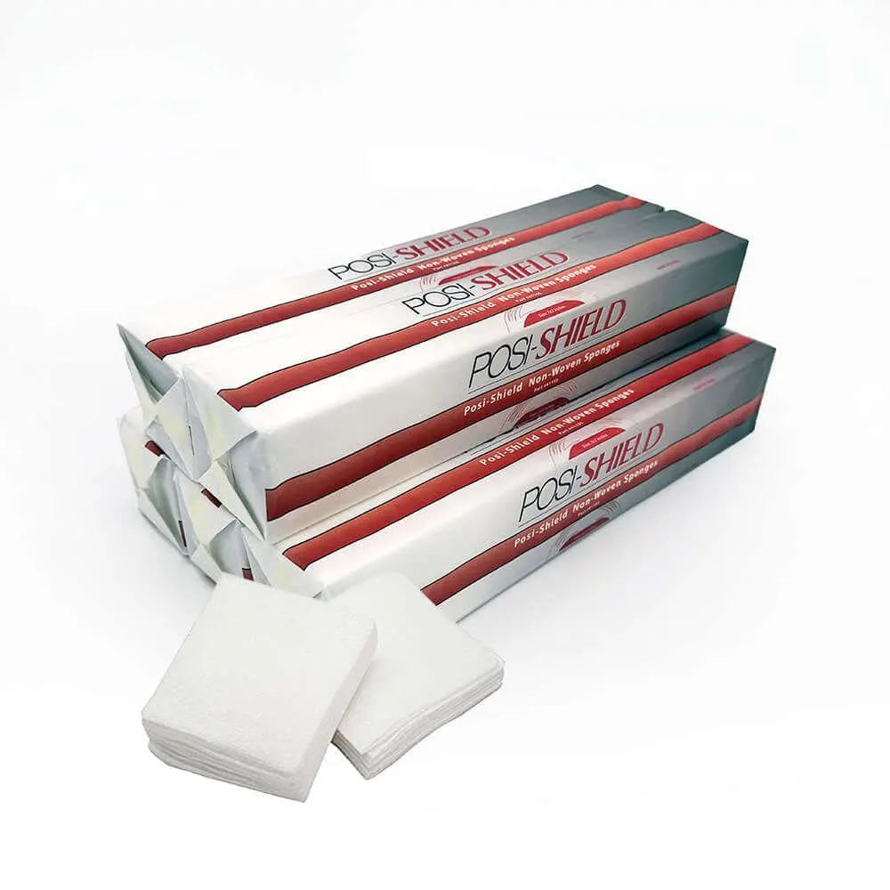 POSI-SHIELD packaging with white 2x2 non woven gauzes on a white background